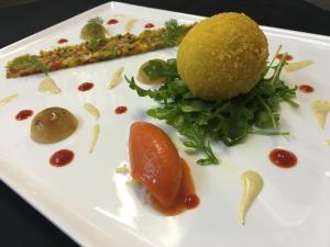 a white plate with some food on it at Thalacap Île de Ré - Thalasso & Spa in Ars-en-Ré