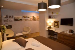 TV a/nebo společenská místnost v ubytování Guest house Crisogono
