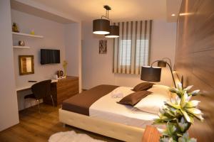 Postel nebo postele na pokoji v ubytování Guest house Crisogono