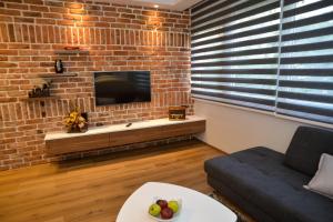 TV a/nebo společenská místnost v ubytování Guest house Crisogono