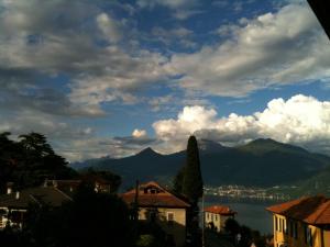 a view of a city and a body of water at Hotel Adler in Menaggio