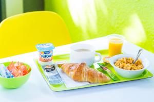 a tray of food on a table at ibis Styles Reading Centre in Reading