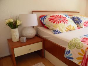En eller flere senger på et rom på Apartment Adria