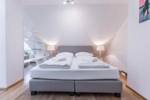 Postel nebo postele na pokoji v ubytování Parkview Boutique Apartments