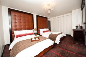Postel nebo postele na pokoji v ubytování Sanctuary Hotel New York