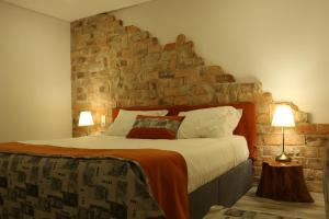 Letto o letti in una camera di Art'Otel Barcelos