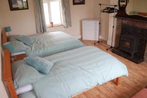 Ένα ή περισσότερα κρεβάτια σε δωμάτιο στο Harry's House