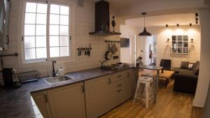 Kuchyň nebo kuchyňský kout v ubytování Valencian Apartment