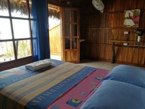 Voodi või voodid majutusasutuse Cocoa Inn Hostal toas