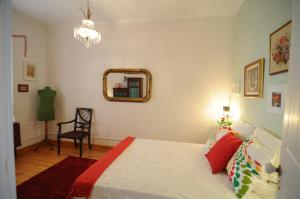 Кровать или кровати в номере Casa do Jardim