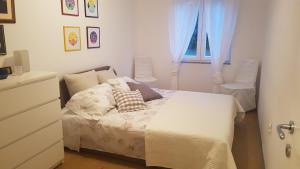 Ένα ή περισσότερα κρεβάτια σε δωμάτιο στο Holiday House Altea