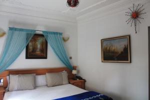 Ένα ή περισσότερα κρεβάτια σε δωμάτιο στο Malabata Guest House
