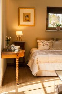 Postel nebo postele na pokoji v ubytování B&B De Vossenbarm