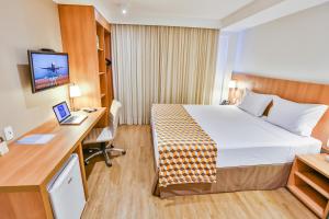 Postel nebo postele na pokoji v ubytování Sleep Inn Aeroporto de Guarulhos - São Paulo