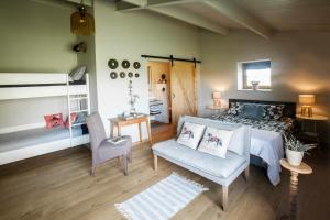 Postel nebo postele na pokoji v ubytování B&B De Vossenbarm