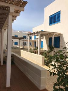 a view of a house from the deck at Favignana Holidays in Favignana