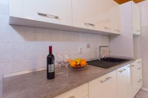 Kuchyň nebo kuchyňský kout v ubytování Apartment Felix