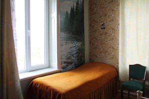 Postel nebo postele na pokoji v ubytování TLT Guest House