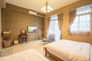 Postelja oz. postelje v sobi nastanitve Vicking Guesthouse