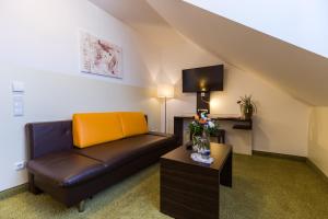 Posezení v ubytování Hotel Arooma