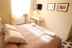 Ένα ή περισσότερα κρεβάτια σε δωμάτιο στο Luxury Apartment Residence la Fontana