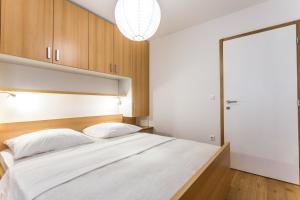 Postel nebo postele na pokoji v ubytování Villa Antonina