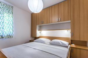 Postel nebo postele na pokoji v ubytování Villa Antonina