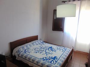 Ένα ή περισσότερα κρεβάτια σε δωμάτιο στο Terra Di Eloro