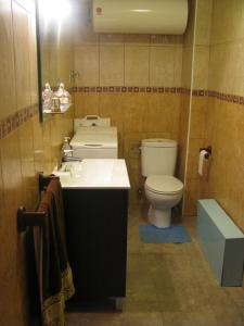 Koupelna v ubytování Apartamentos Santabarbara + 33 fotografií