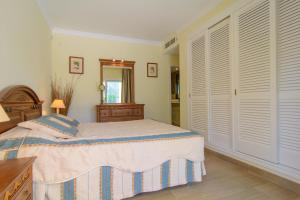 Postel nebo postele na pokoji v ubytování Apartment Hacienda Playa Elviria