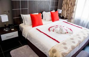 Ein Bett oder Betten in einem Zimmer der Unterkunft Gelian Hotel