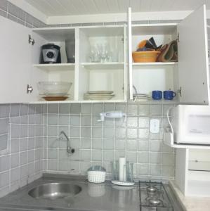 Kuchyňa alebo kuchynka v ubytovaní Farol Barra Flat