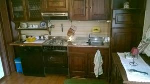 A kitchen or kitchenette at Centralissimo Antey