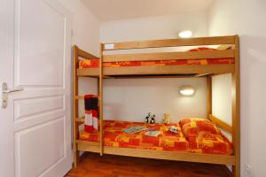 Postel nebo postele na pokoji v ubytování Résidence Néméa Les Balcons d'Ax