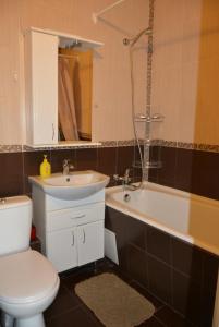 Koupelna v ubytování Apartments in the heart of Dnipro