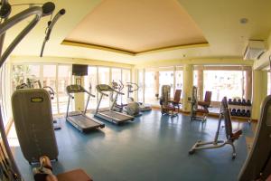 a gym with several treadmills and cardio machines at The Breakers Diving and Surfing Lodge Soma Bay in Hurghada