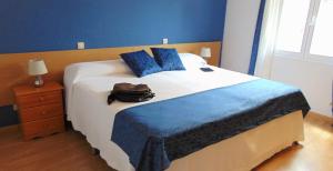 Cama o camas de una habitación en El Rincón de Antonio
