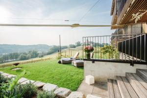 Balkón nebo terasa v ubytování Wohnen im Wein