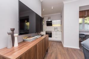 Kuhinja ili čajna kuhinja u objektu Sunset Beach Apartment