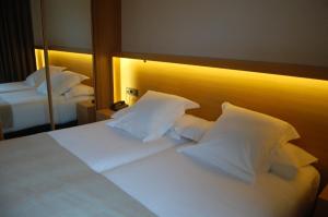 Posteľ alebo postele v izbe v ubytovaní Hotel Araba