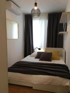 Säng eller sängar i ett rum på K Residence Zadar apartment