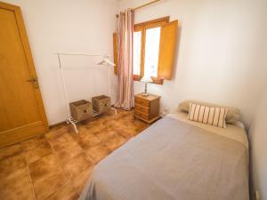 Ein Bett oder Betten in einem Zimmer der Unterkunft Bunyola