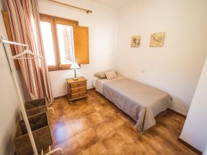 Ein Bett oder Betten in einem Zimmer der Unterkunft Bunyola