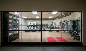 Fitness centrum a/nebo fitness zařízení v ubytování La Cappella Business Boutique Hotel