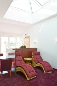Posezení v ubytování Hotel Petersen