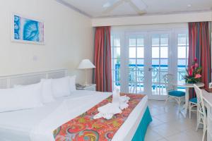 Кровать или кровати в номере Rostrevor Hotel