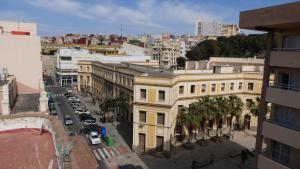 an overhead view of a city street with buildings at Hotel Rusadir in Melilla
