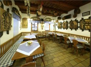 an overhead view of a restaurant with tables and chairs at Valašský Šenk in Vizovice