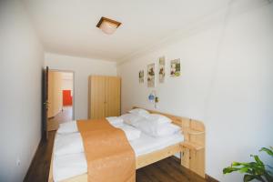 Posteľ alebo postele v izbe v ubytovaní Jerry Apartman