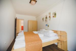 Posteľ alebo postele v izbe v ubytovaní Jerry Apartman